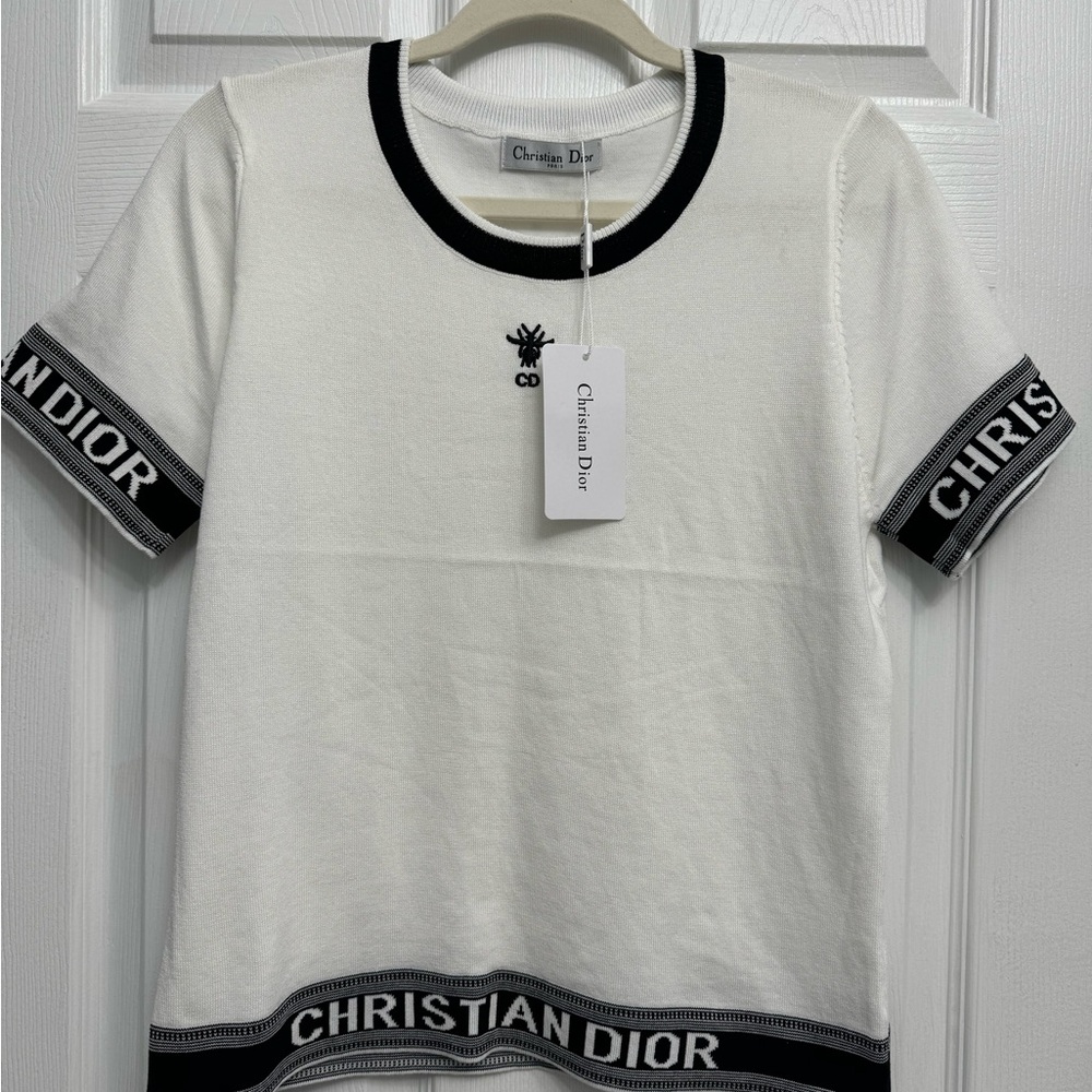 Stretchy White fashion top with black trim